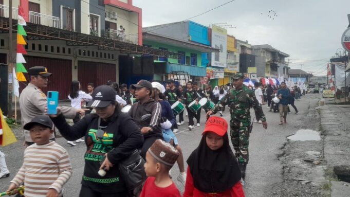 Personel Koramil 1710-02/Timika Amankan Kegiatan Pawai Ta’aruf Dalam Rangka MTQ Ke-30