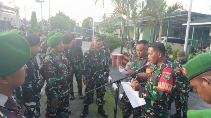 Pasiops Kodim 1710/Mimika Pimpin Apel Kesiapan Pasukan TNI Pada Pengamanan TPS Pemilukada Tahun 2024 BKO Polres Mimika