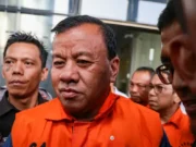 Bupati Kuansing Ditahan, Jalan Rusak Dibiarkan saat Suap Mobil Mewah Dicairkan