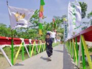 Jembatan Rp300 Juta dari Kembalian Belanja Konsumen Alfamart