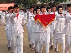 Senja Khidmat di Lapangan Gelora Pemuda Panti, Danramil 0824/14 Panti Pimpin Penurunan Bendera HUT RI ke-81