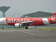 Penumpang AirAsia Usahakan Buka Pintu Pesawat Saat Terbang