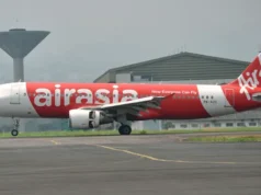 Penumpang AirAsia Usahakan Buka Pintu Pesawat Saat Terbang