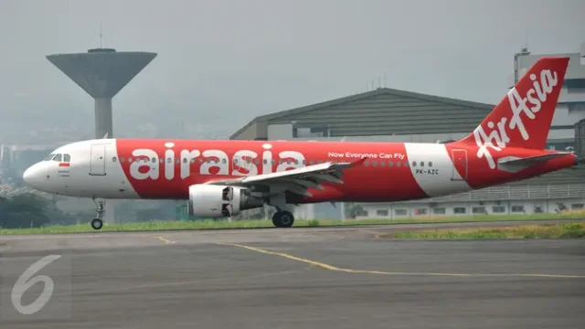 Penumpang-AirAsia-Usahakan-Buka-Pintu-Pesawat-Saat-Terbang