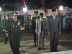 Bupati SumbawaHadiri Apel Kehormatan dan Malam Renungan Suci di TMP Labuhan Badas