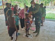 Sinergi Satgas TMMD Dan Dinkes, Cegah Stunting Melalui Pengecekan Tinggi dan Berat Badan Anak di Kampung Yamboi